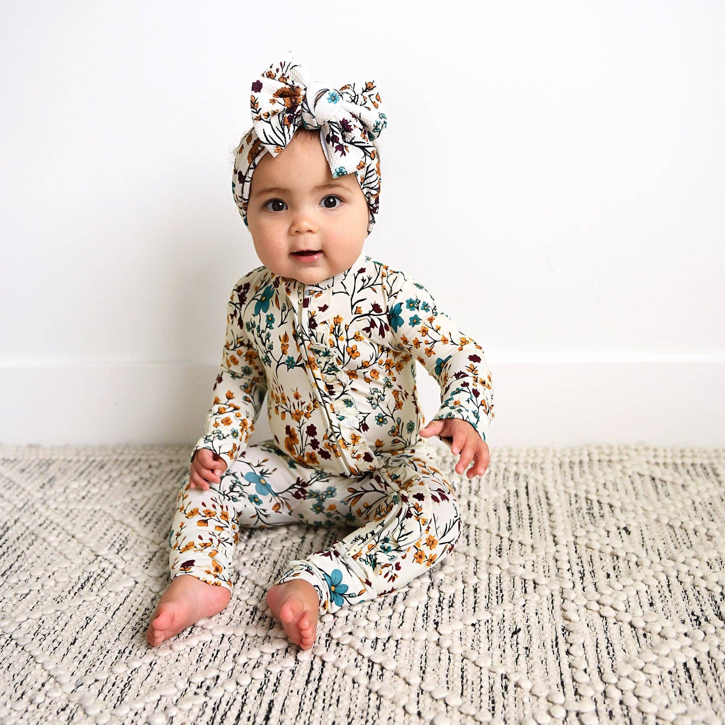 Maren Floral Ruffle Zip Romper