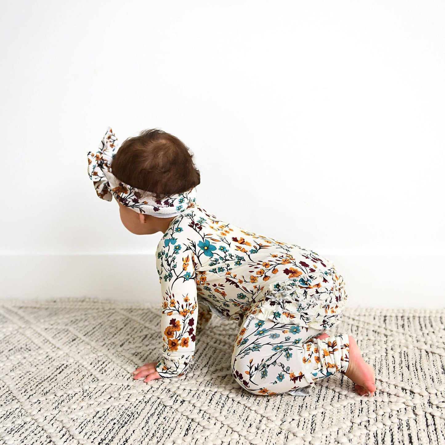 Maren Floral Ruffle Zip Romper