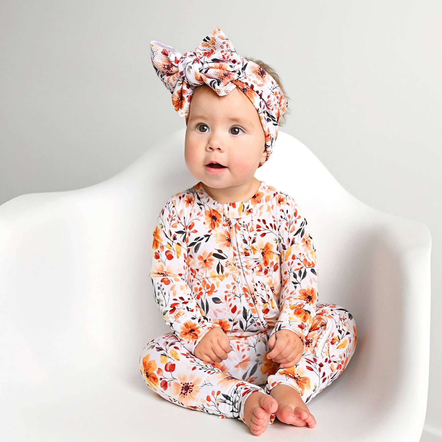 Phoebe Ruffle Zip Romper