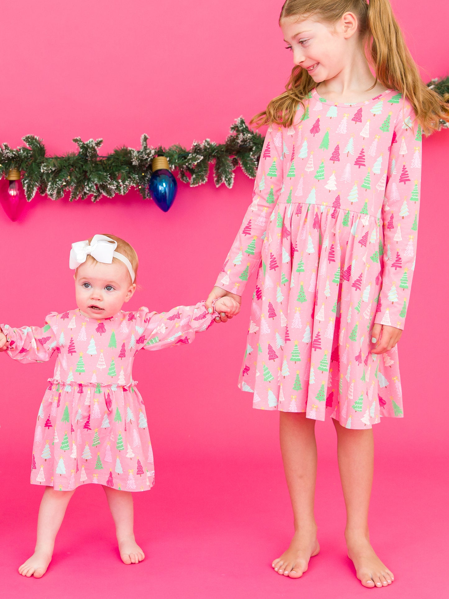 RuffleButts Merry Pink Pines Skirted Romper